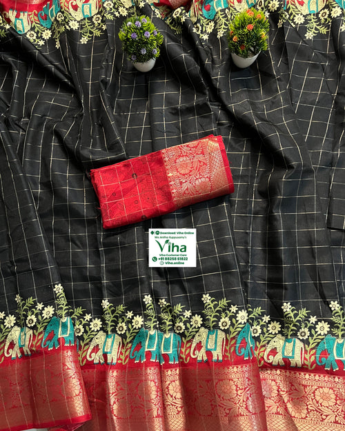 Dola Silk with Blouse & with Pallu, black fabric with thin light lines, a red-and-gold border, elephant motifs, flowers, and a folded red cloth piece