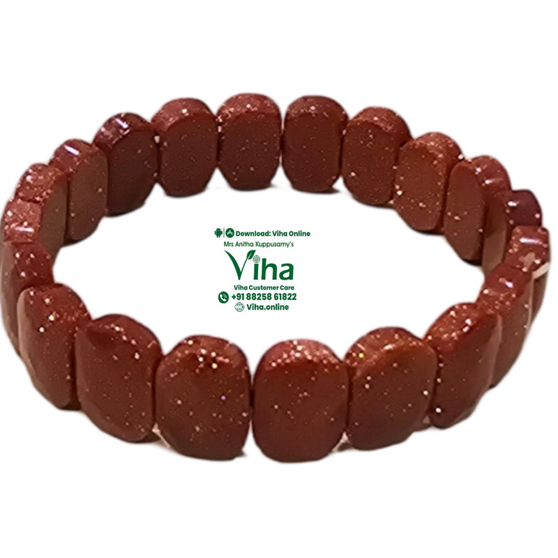 Red Gold Stone Bracelet with sparkling reflective inclusions
