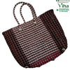 Wire Koodai, a woven tote bag features a brown, white, and pink checkered pattern, two arched handles, and three silver-toned feet on the base