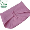 Baby Langott Pure Cotton, a folded pink fabric cover with a tied string closure on the front