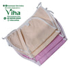 Baby Langott Pure Cotton, folded fabric items in beige and pink with white binding edges and ties