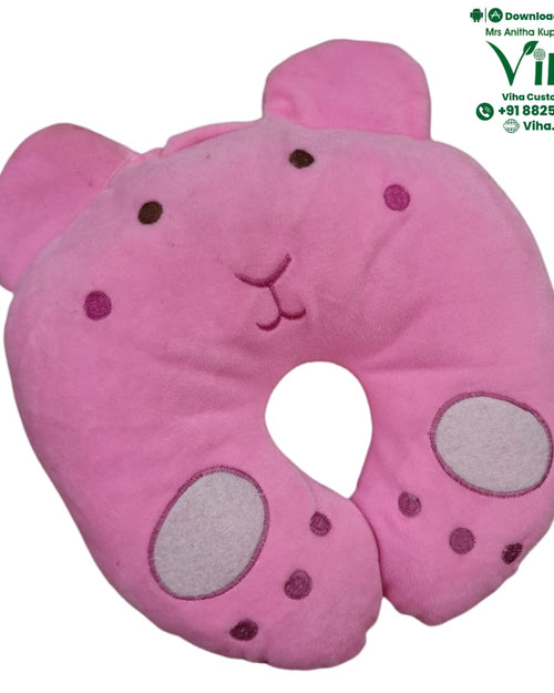 Baby Monkey Pillow Soft, a pink U-shaped plush toy with two ears, embroidered facial features, and paw pad details