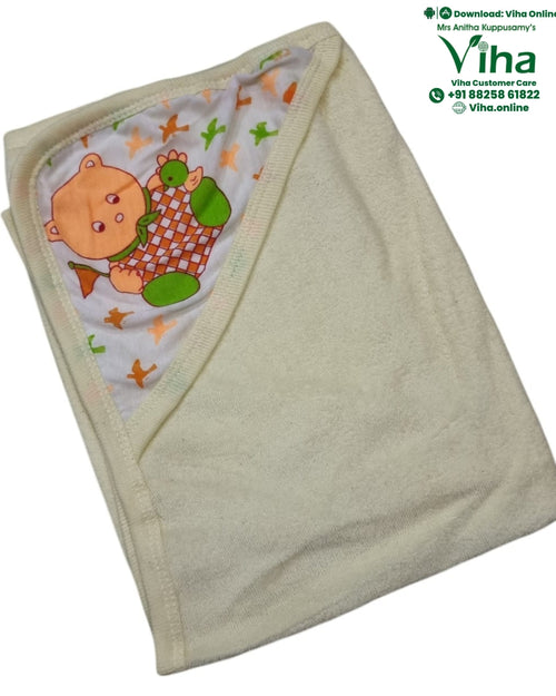 Baby Towel Sheet, a cream-colored textured fabric towel features an attached hood with a cartoon bear graphic and orange and green patterns against white