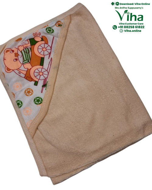 Baby Towel Sheet in beige with a teddy bear on a tricycle print lining