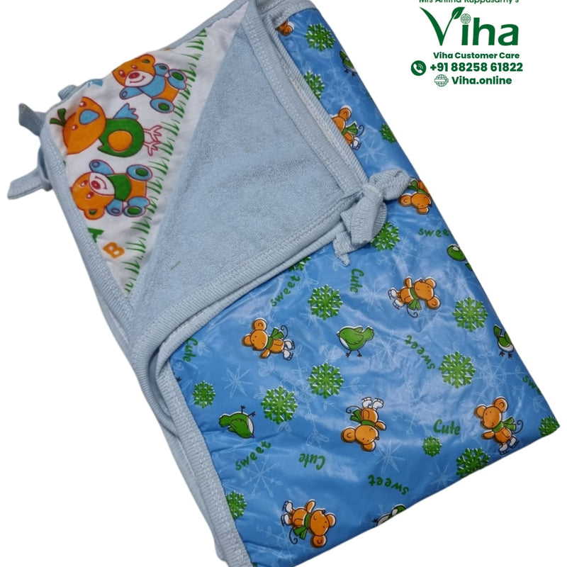 Folded light blue baby wrap with a cartoon bear and bird print