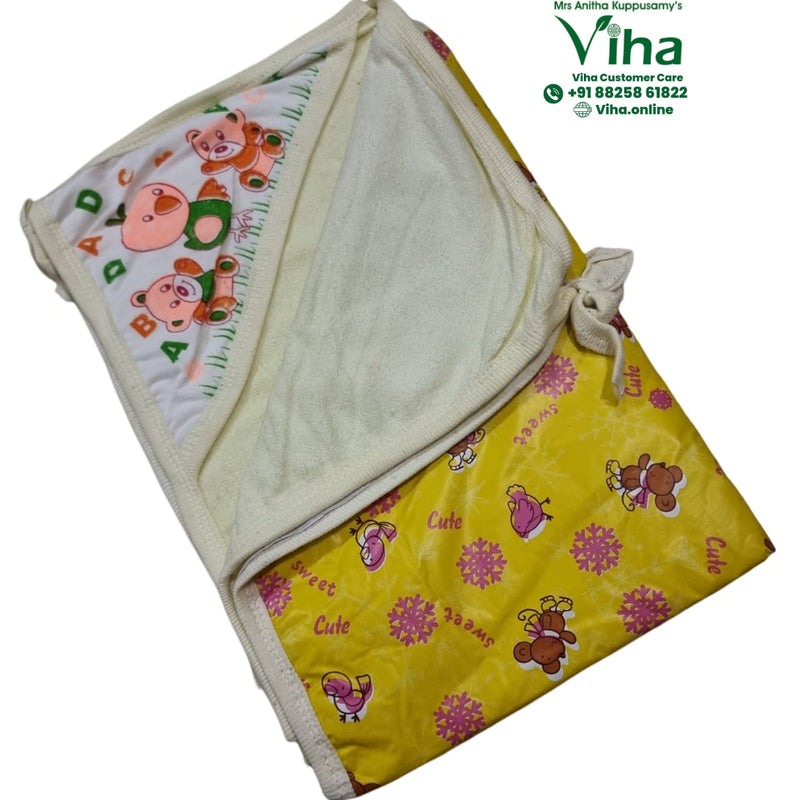 Baby Sheet with Towel - Water Proof, a folded yellow blanket featuring brown bear and pink bird graphics with tied fabric corners