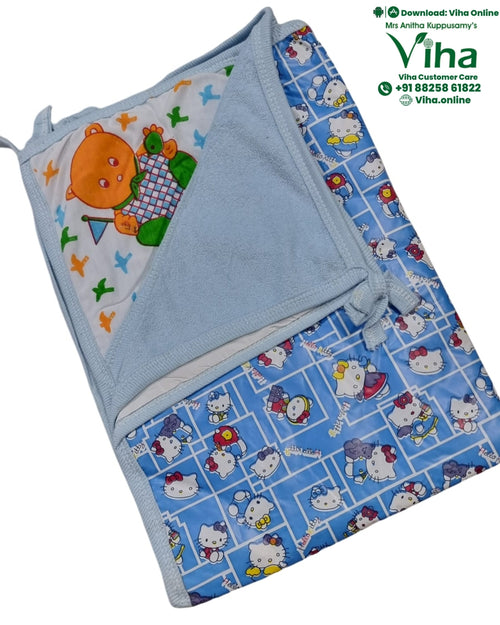 Baby Sheet With Towel - Water Proof, a folded rectangular textile piece featuring blue, white, and multicoloured patterned panels with cartoon illustrations