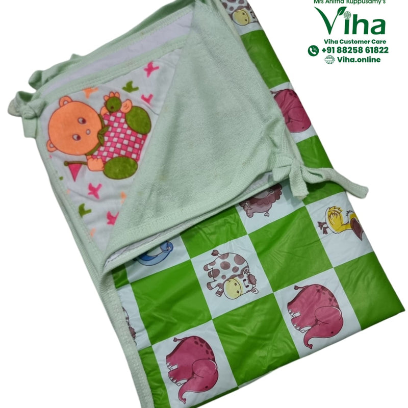 Baby Sheet With Towel - Water Proof, folded green and white textile sheet featuring cartoon animal prints and a soft hood section