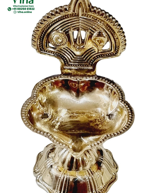 Perumal lamp in brass, Perumal namam crest above a rounded oil bowl on a fluted beaded foot