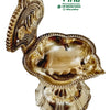 Perumal Lamp, a glossy gold-toned metallic oil lamp featuring a scalloped bowl, fluted pedestal base, and an ornate, patterned upright backplate