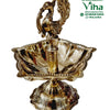 Annapakshi Lamp - Brass, a shiny gold-toned metal bowl with a beaded rim and a central pedestal topped by a peacock figure standing on a pedestal base
