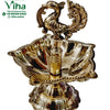 Brass annapakshi lamp, twin swan finial over a deeply fluted scalloped oil dish with beaded rim