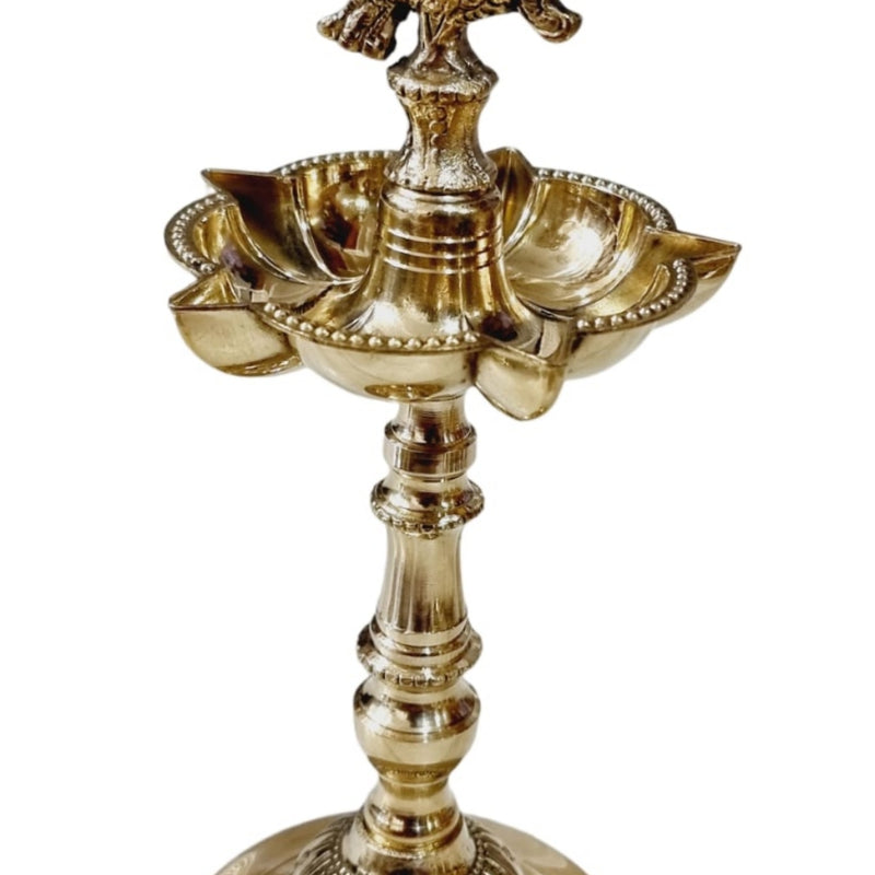 Annapakshi designer kuthu vilakku in brass, paired swan finial above a five-point oil well and fluted base