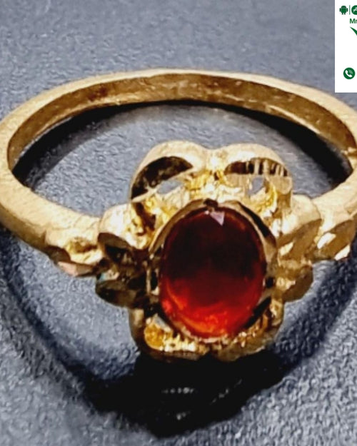 Impon Ring, band with an oval red stone and floral metalwork