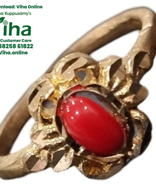 Impon Ring, circular band with an oval red stone and textured metal