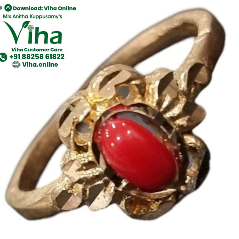 Impon Ring, circular band with an oval red stone and textured metal