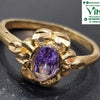 Impon Ring with purple stone and scalloped metal setting