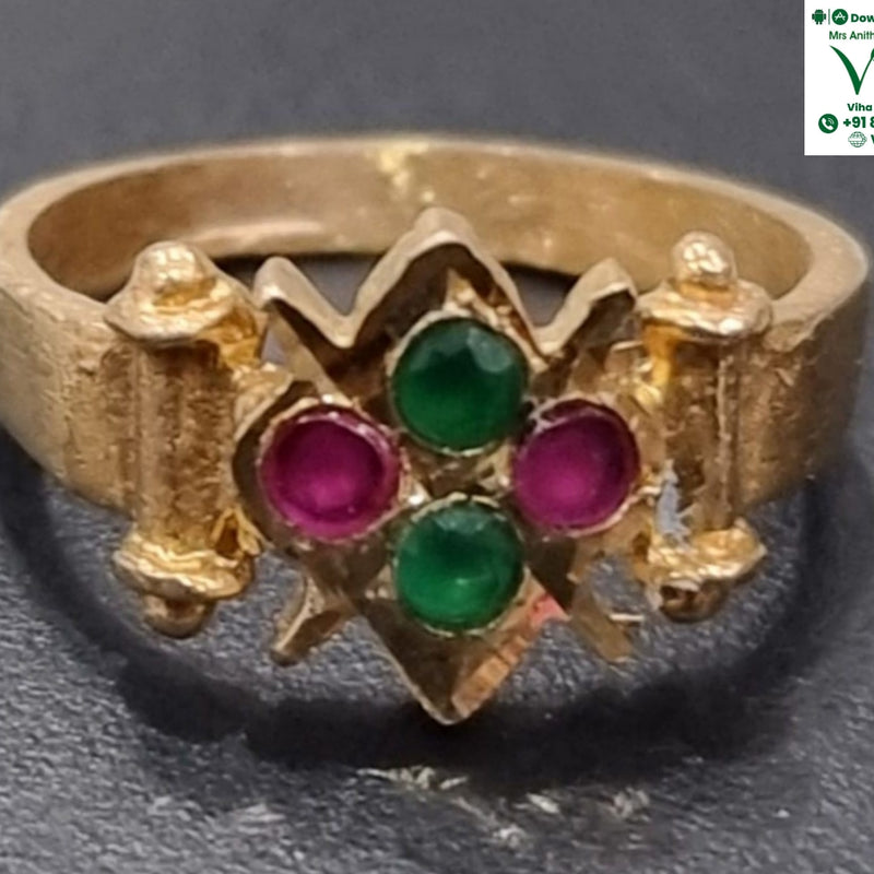 Impon Ring in a gold-tone band set with two green stones and two pink stones in a diamond pattern