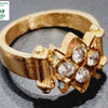 Impon Ring, ornate central cluster with four translucent stones
