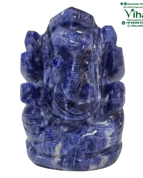 Sodolite Ganesha with carved facial features and curved trunk
