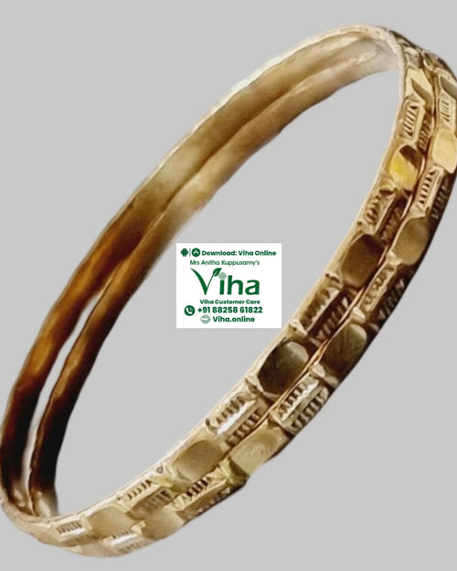 Impon Bangle, a pair of twisted bronze-toned bangles with ridged texture
