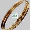 Impon Bangle, a pair of twisted bronze-toned bangles with ridged texture