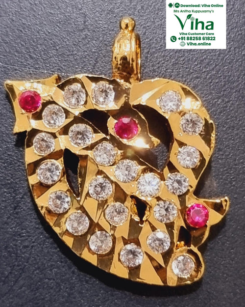 Impon Pendant in an irregular leaf shape with clear and red round stones