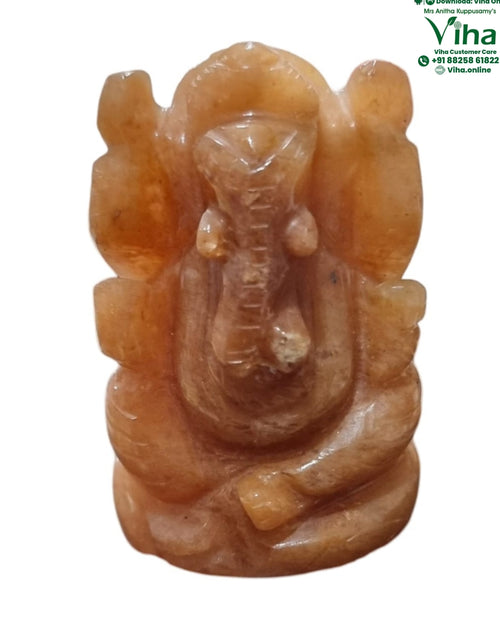Red Aventurine Ganesha with carved trunk and seated posture