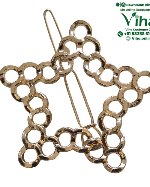 Hair Clip, a gold-toned metal hairpin featuring a star-shaped ornament constructed from an arrangement of interconnected open circles