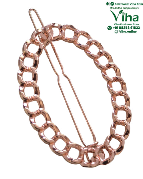 Hair Clip, a shiny rose-gold-toned hair clip featuring a chunky, interlinked chain loop around two thin pins