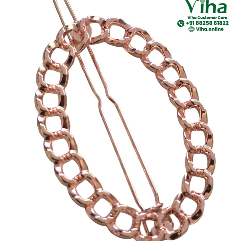 Hair Clip, a shiny rose-gold-toned hair clip featuring a chunky, interlinked chain loop around two thin pins