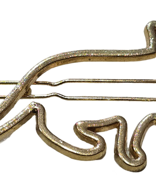 Hair Clip, a gold-tone wire hairpin shaped like a cat