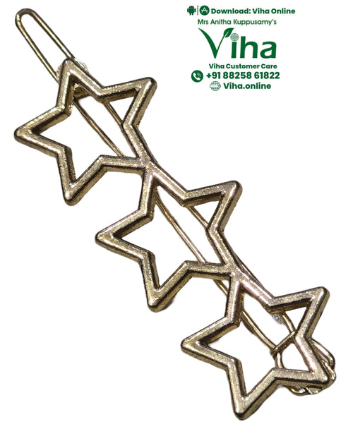 Triple Star Hair Clip, a gold-toned metal barrette featuring three connected open star shapes with textured finishes