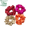 Four gathered satin hair bands in burgundy, magenta, gold-toned and orange