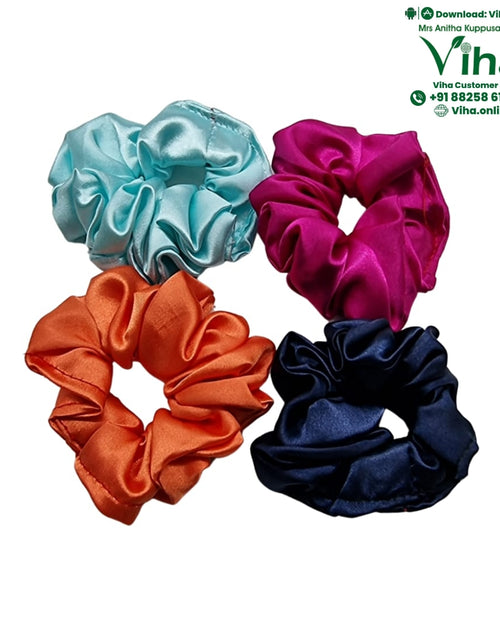 Four gathered satin hair bands in light blue, magenta, orange and dark blue