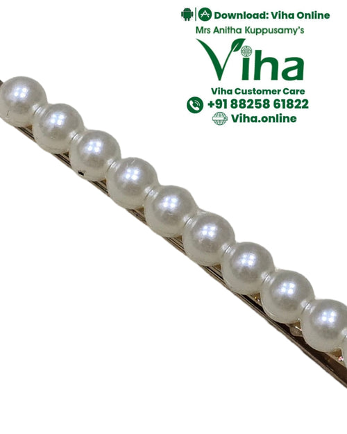 White Bead Hair Clip, a gold-toned metal hairpin decorated with twelve white spheres aligned in a single row along its top surface