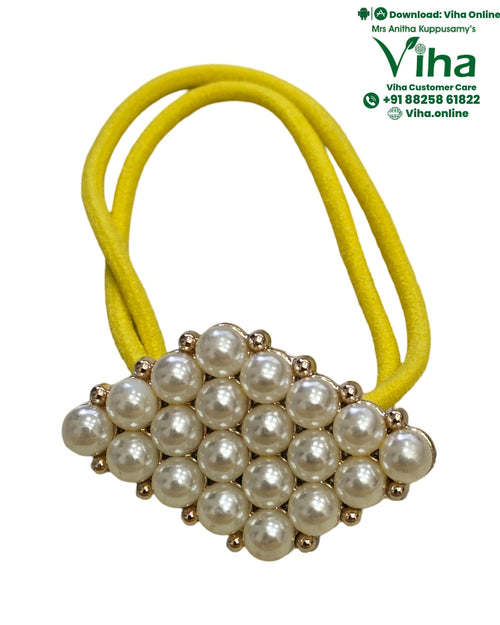 Hair Band, a yellow hair band features a rhombus-shaped cluster of twenty-four white beads in gold-toned settings
