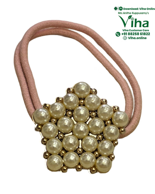 Hair Band with White Beads on a dusty pink elastic loop, finished with a diamond-shaped pearl bead cluster in a gold setting
