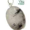 Black Rutile Silver Pendant, a smooth oval clear stone with black needle inclusions, framed in silver-toned metal with two top bail loops