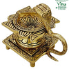 Naga Swastik Deepam / Lamp - Brass, a gold-toned metallic object featuring a lotus-shaped bowl and a cobra handle atop a square stand