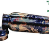 Designer Copper Water Bottle, a blue-and-gold bottle featuring floral patterns lying horizontally with its matching round cap beside it