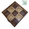 Wooden Masala Box, a square brown box contains nine inner square compartments in alternating light and dark wood tones, covered by a clear glass lid