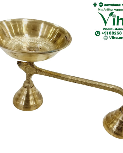 Dhoop Holder, brass holder with a wide shallow bowl on a bell foot and a long curved arm ending in a second bell foot