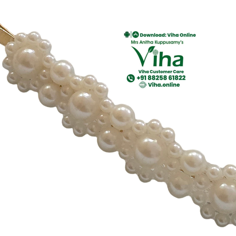 Beads Floral Hair Clip, a gold-toned metal barrette decorated with three large white beads surrounded by smaller white beads