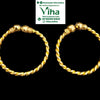 Impon Baby Kappu Adustable, two gold-toned twisted hoop rings with round ends and ridged details against a black background