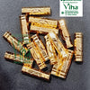 Impon Thali Nanal Kuzha, gold-toned ridged tube beads piled together