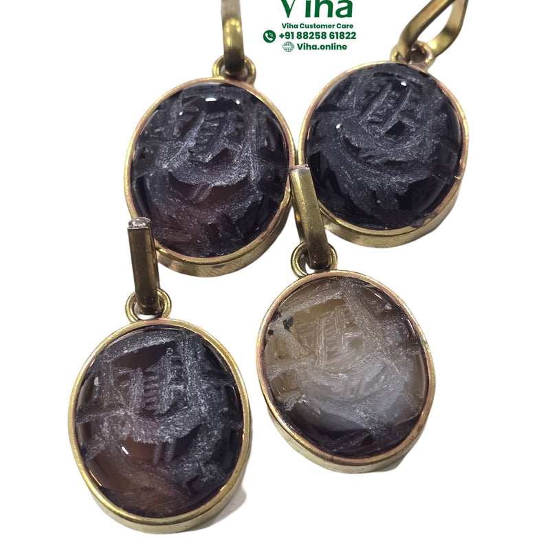 Natural Tiger Eye Stone Ganesha Pendant with carved surface patterns
