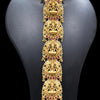 Women's Gajra with embossed figures and filigree detailing