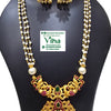 White Beads Chain Set, a gold-toned jewelry set with white beads, red and green stones, featuring a three-strand necklace and matching jhumka earrings