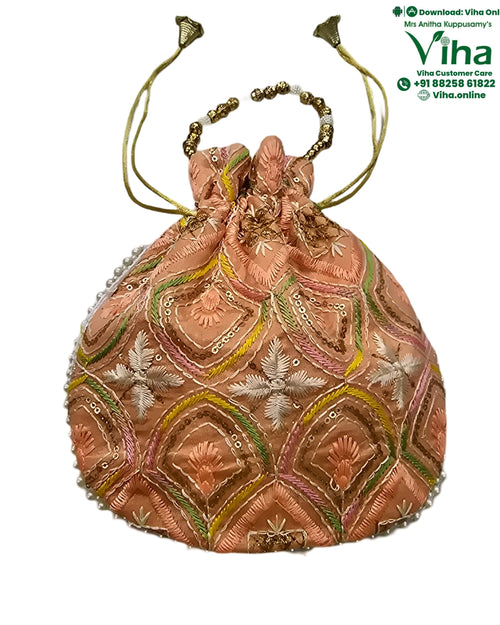 Designer Potli Bag, embroidered geometric patterns and drawstring closure with tassels
